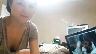 Brunette sucks and swallows while bf watches porn
