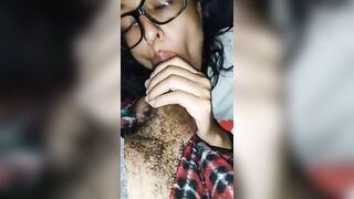 Latina in glasses blows during ride