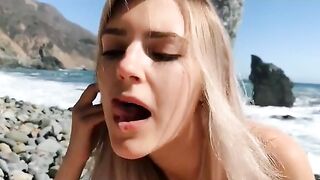 Hot girl with big natural tits gives blowjob at the beach