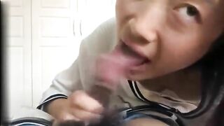 Asian teen sucking cock