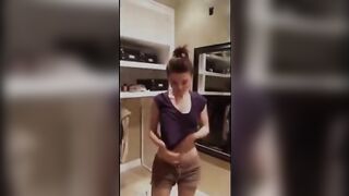 Young white babe fingers herself till orgasm in walking wardrobe