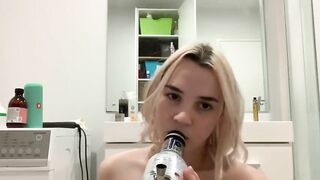 Blonde teen babe masturbates in the bathroom