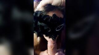Sexy masked babe sucking hard cock